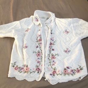 Embroidered sweater with pearl buttons